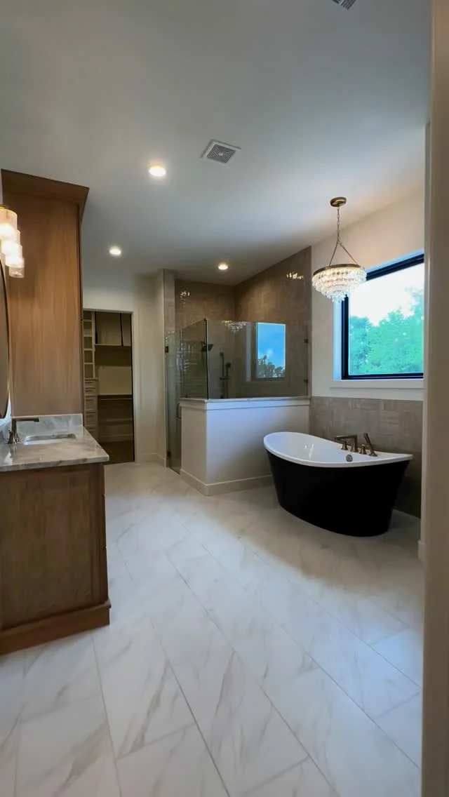 A primary bathroom in a Tredway custom home
