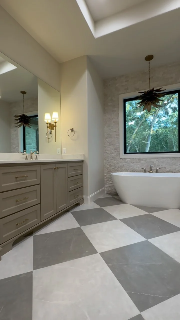 A primary bathroom in a Tredway custom home