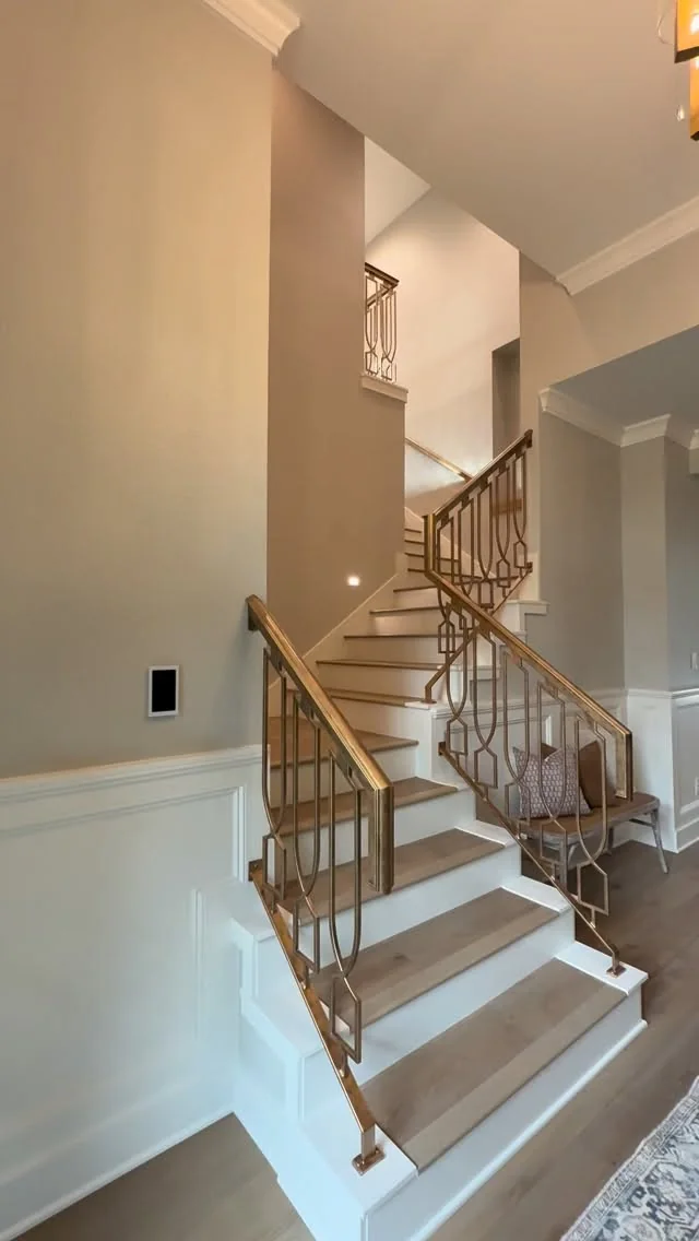 A custom stair and railing in a Tredway home