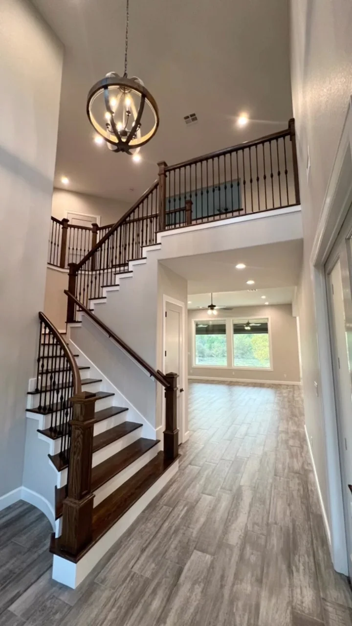 A custom stair and railing in a Tredway home